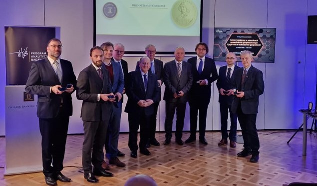 A group of people with the medals